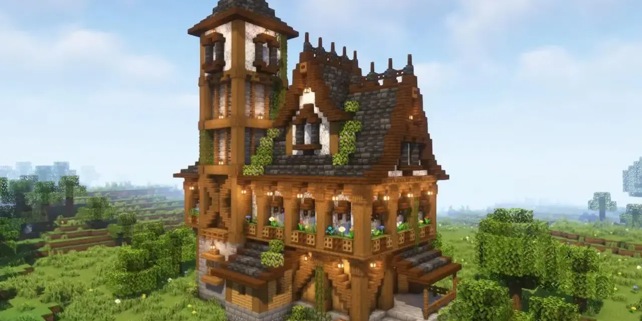 Una mansión de Minecraft con torre alta, tejados de pizarra y madera, rodeada de un paisaje verde y frondoso.