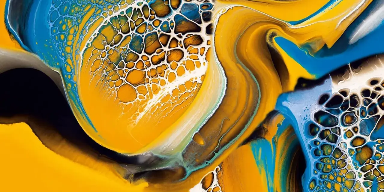 Vibrant yellow, blue, and white paint swirls create a mesmerizing cellular pattern, a testament to the ultimate pouring technique.
