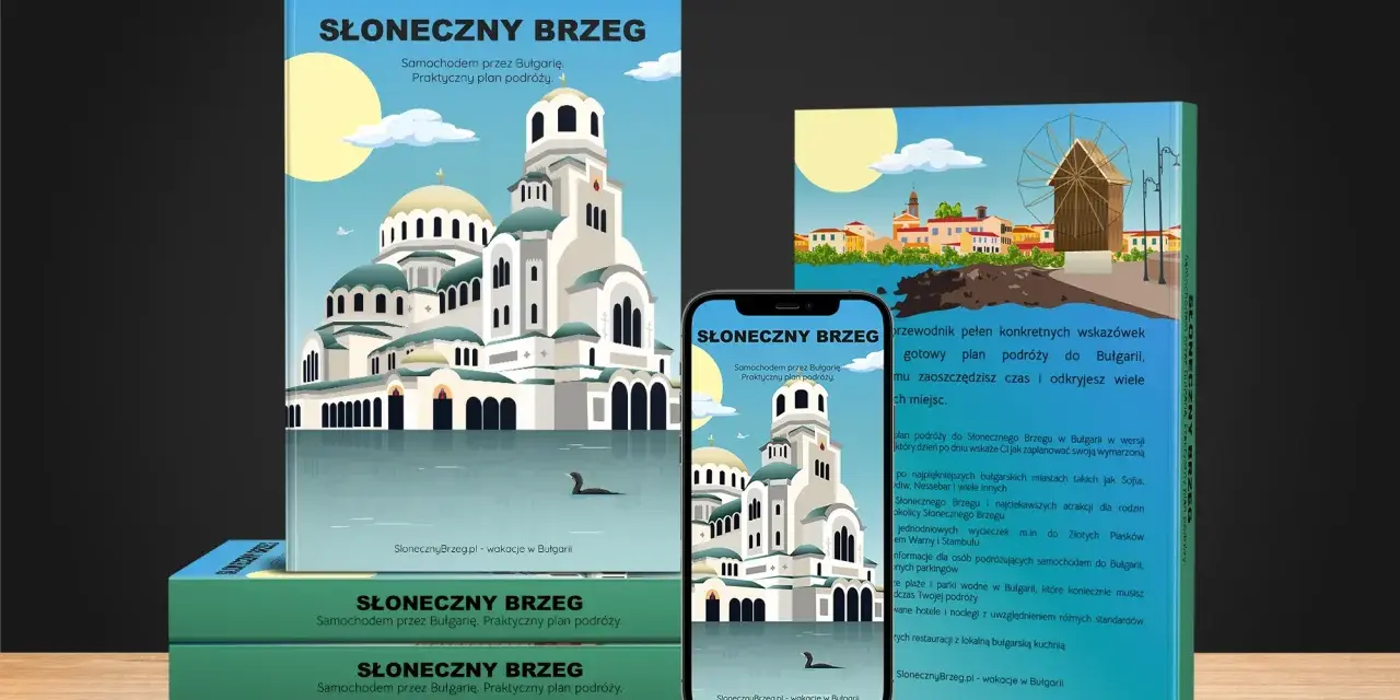 Okładki przewodników i smartfon z widokiem na cerkiew i plażę.