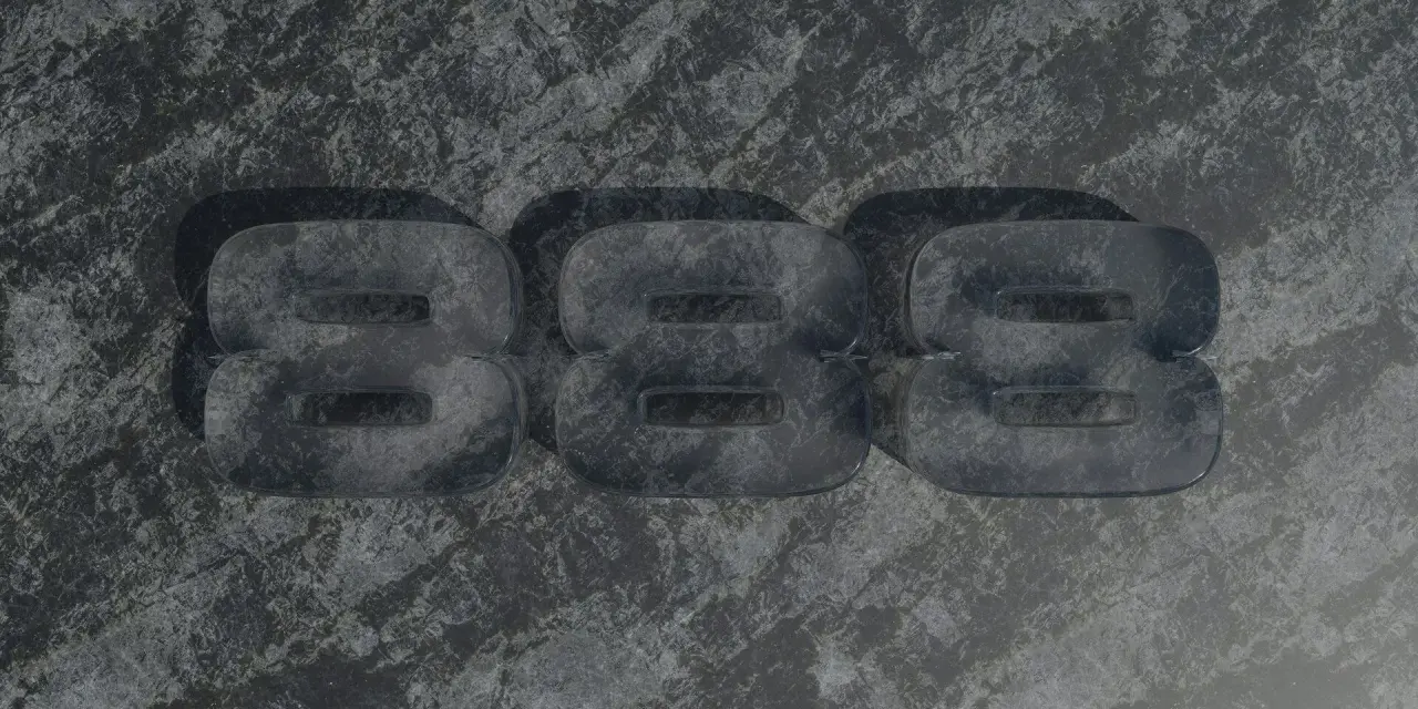 Trzy przezroczyste ósemki na kamiennym tle. 8888 znaczenie - symbol nieskończoności, obfitości i duchowego przebudzenia.