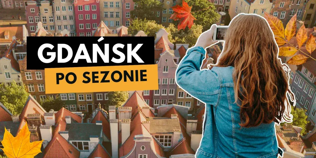 Dziewczyna robi zdjęcie jesiennemu Gdańskowi. Idealne miejsce na zwiedzanie po sezonie.