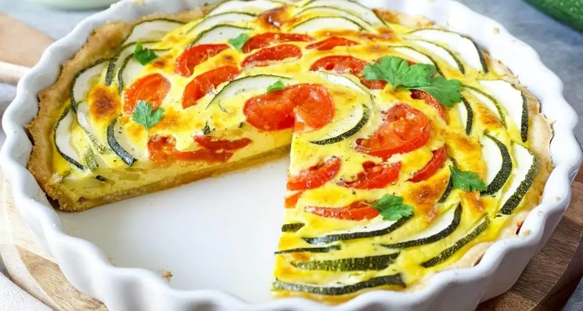 Herzhafte Quiche mit Zucchini und Tomaten, perfekt für Kinder. Ein leckerer Genuss!