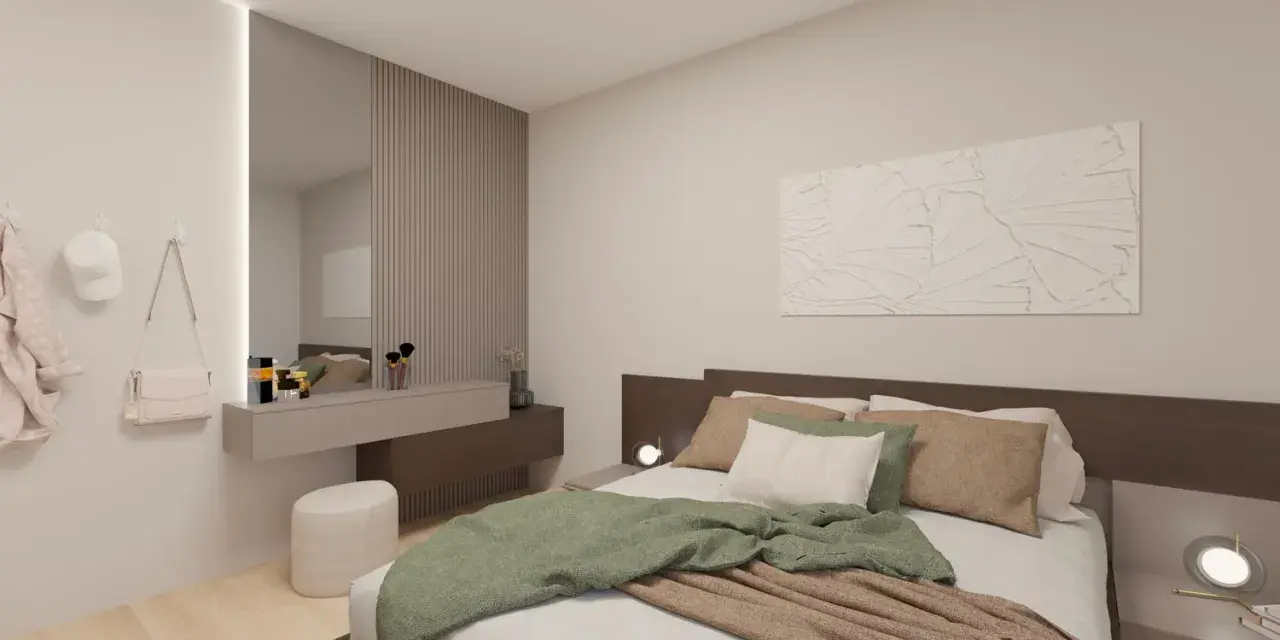 Camera da letto con idee originali: letto accogliente, specchio a parete, toeletta con cosmetici e appendiabiti.