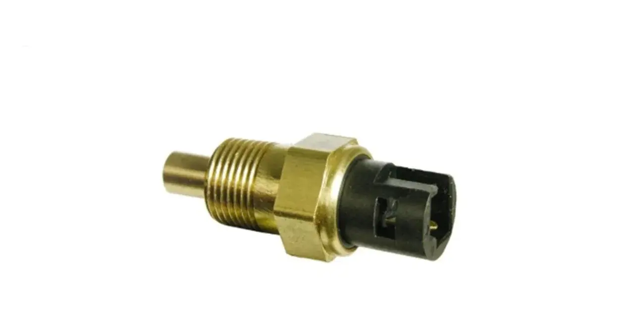 A brass automotive sensor with a black connector, likely a faulty coolant temperature sensor, isolated on a white background.