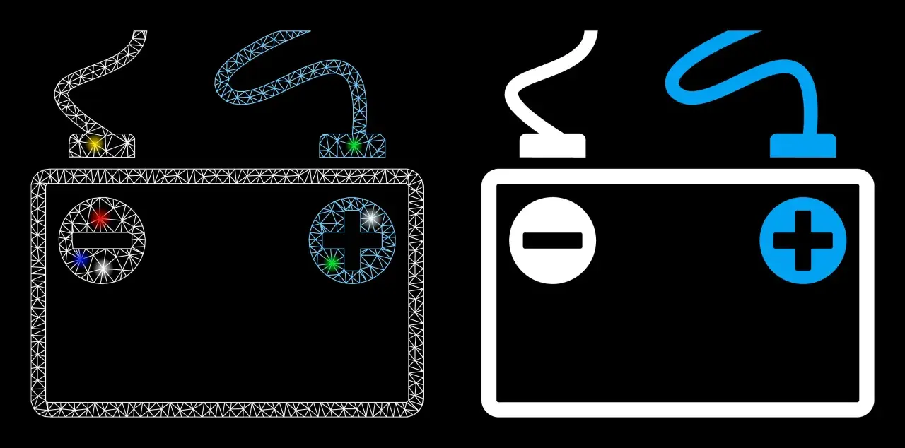 Akumulator z oznaczeniami biegunów i kablami. Zastanawiasz się, jakim prądem ładować akumulator?