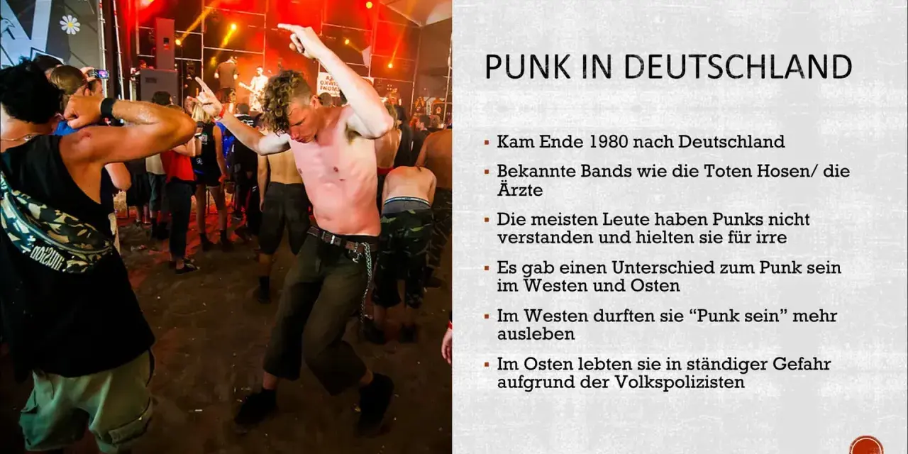 Junge Männer tanzen ausgelassen zu Punk-Songs auf einem Festival. Die Szene zeigt die Energie und Rebellion der Punk-Bewegung in Deutschland.