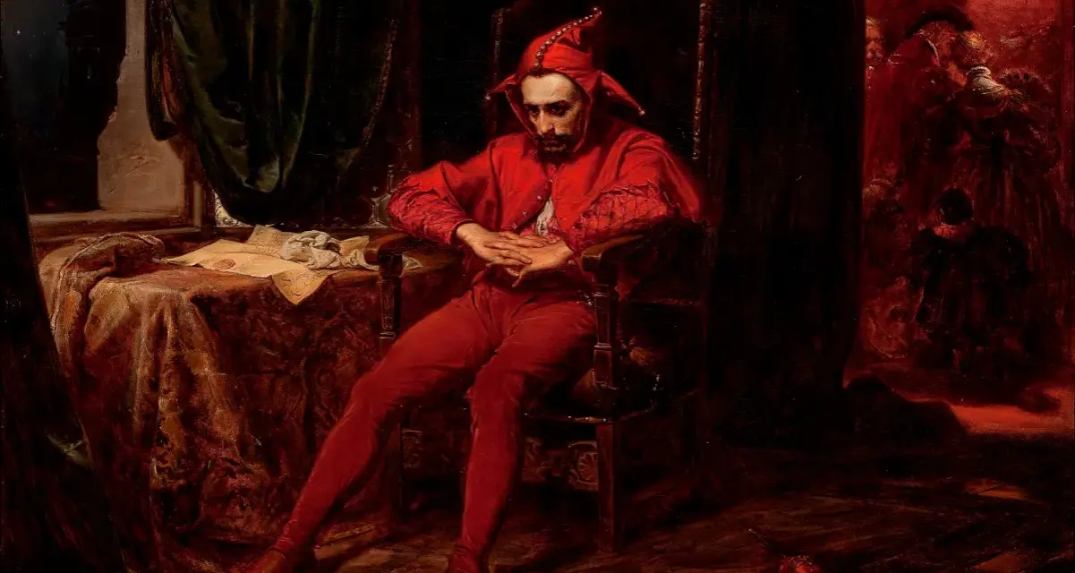 Smutny błazen w czerwonym stroju siedzi na krześle. To jedno z wielu poruszających jan matejko obrazy, ukazujące ludzkie emocje.