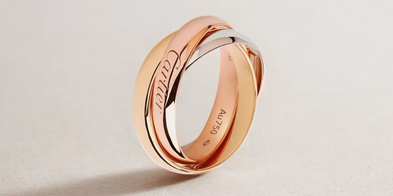 Bague Trinity de Cartier en or rose, or jaune et or blanc, gravée du poinçon cheval.