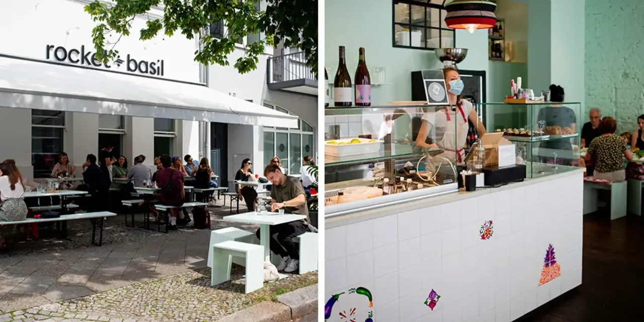 Außenbereich eines Restaurants in Berlin mit Gästen, innen ein Tresen mit einer Mitarbeiterin. Ein gemütliches persisches Restaurant Berlin.