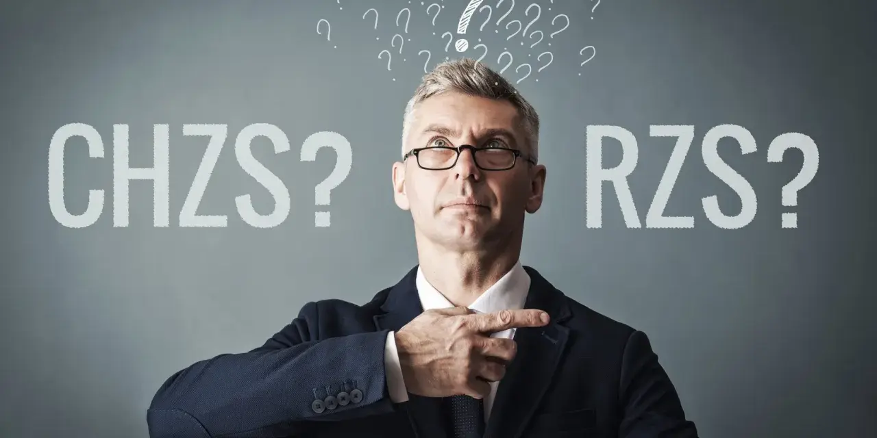 Mężczyzna w garniturze zastanawia się nad objawami zapalenia stawów: CHZS czy RZS?