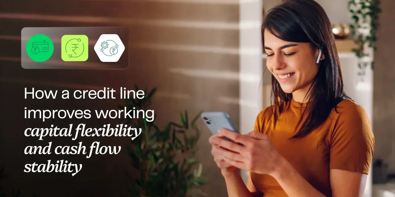 A woman smiles while looking at her phone, with icons representing financial flexibility and a working capital line of credit.