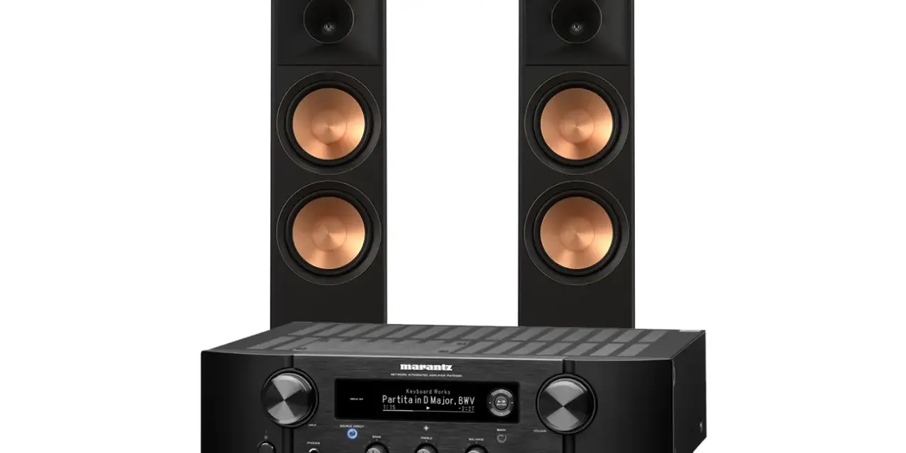 Marantz PM7000N z dwoma czarnymi kolumnami z miedzianymi membranami. Idealny zestaw do słuchania muzyki.
