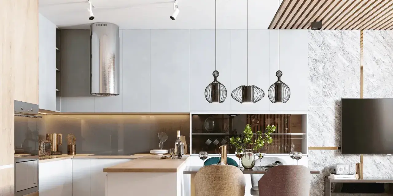 Cocina moderna con campana extractora plateada, lámparas colgantes de diseño y una mesa lista para cenar. La iluminación ambiental crea una atmósfera acogedora, con suficientes **lúmenes por m2** para disfrutar.