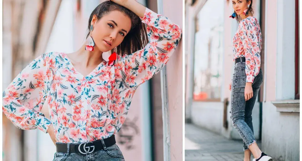 Kobieca stylizacja: jak nosić bluzki w kwiaty. Modelka w kwiecistej bluzce i jeansach, z modnymi kolczykami.