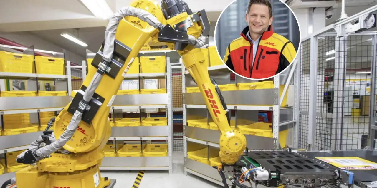 Zautomatyzowany magazyn DHL, duża giełda niemiecka, z robotem i uśmiechniętym menedżerem.
