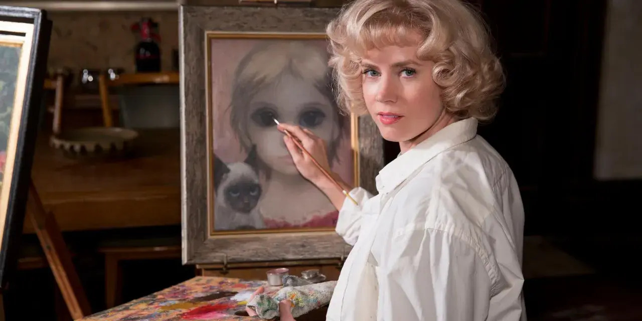 Margaret Keane målar en flicka med stora ögon och en siamesk katt.