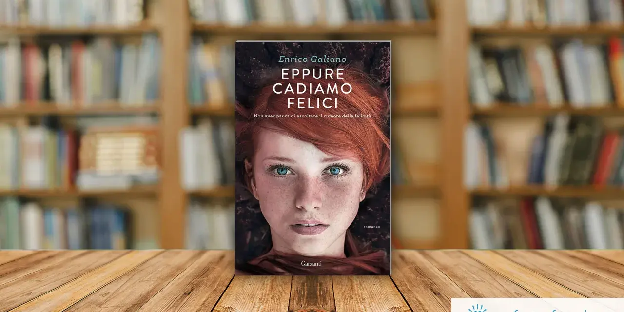 Copertina del libro "Eppure cadiamo felici" di Enrico Galiano, con il volto di una ragazza dai capelli rossi e occhi azzurri.