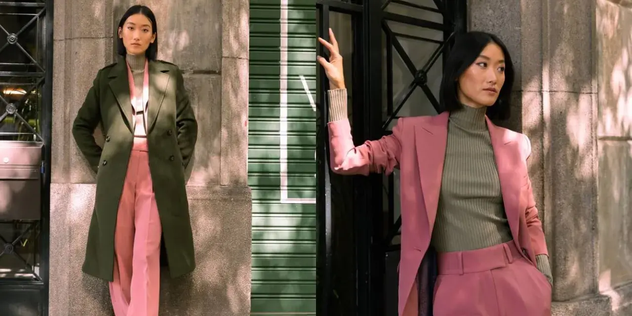 Deux femmes portent des combinaisons vertes et roses. L'une a une veste verte, l'autre une veste rose.