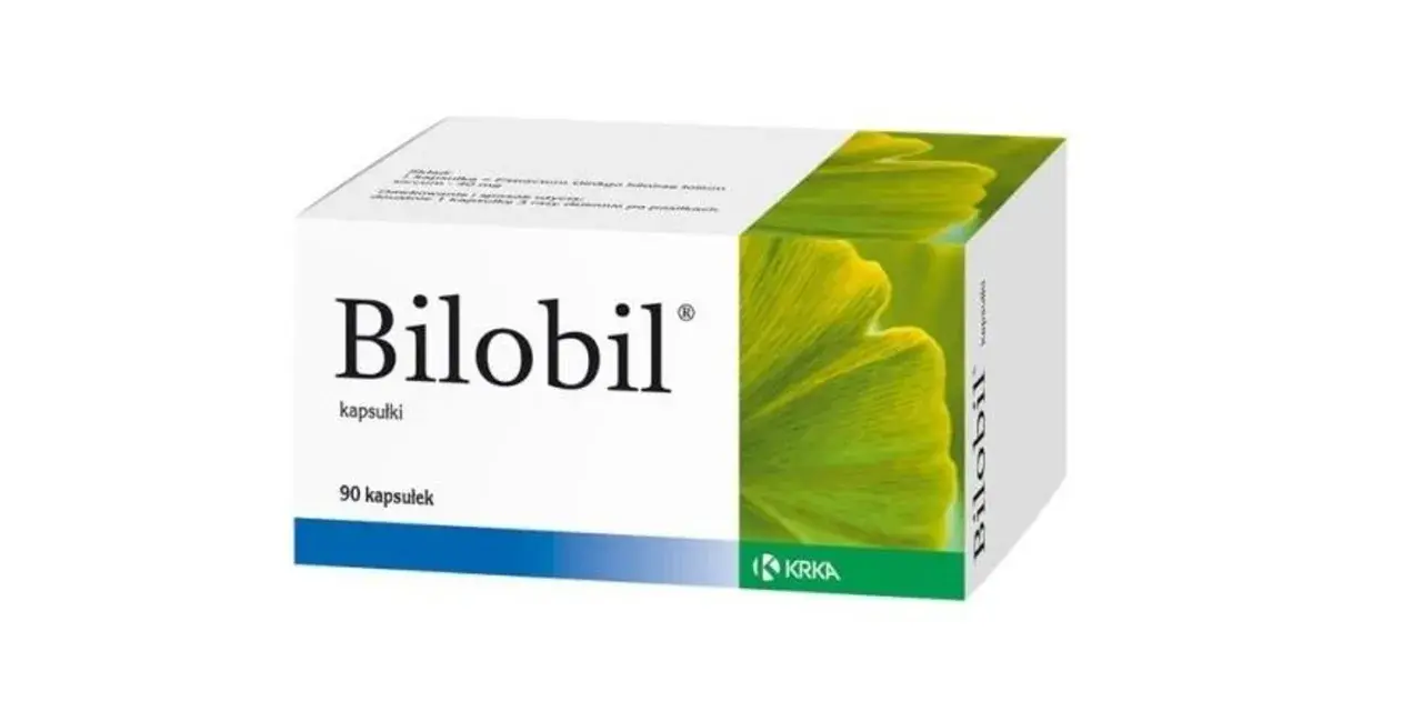 Opakowanie leku Bilobil w kapsułkach, z zielonym liściem miłorzębu.