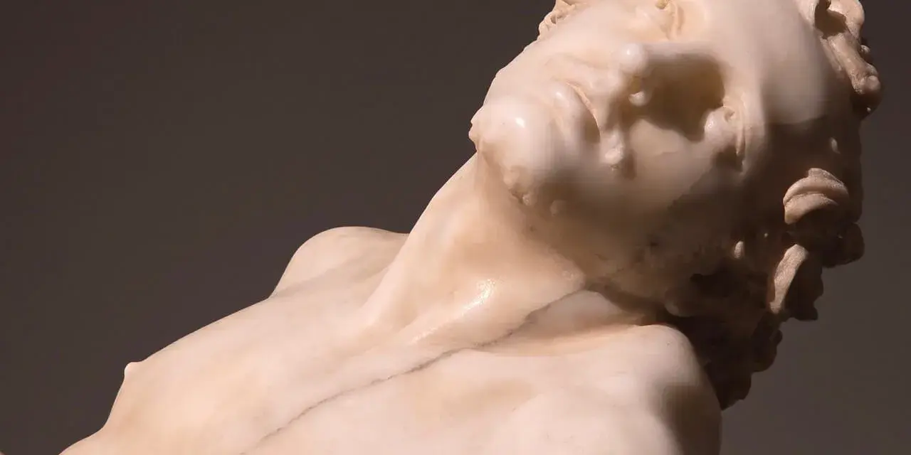 Rzeźba z marmuru przedstawiająca męskie ciało w dramatycznej pozie, dzieło Gian Lorenzo Bernini.