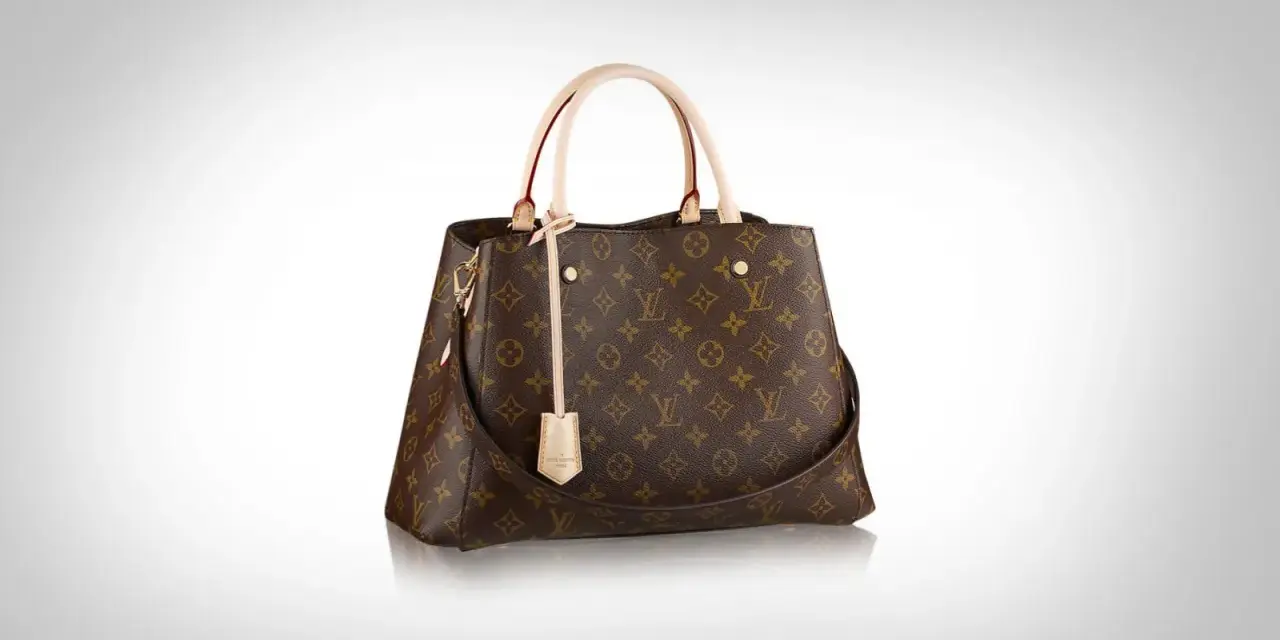 Elegancka torebka LV shopper w klasycznym monogramie, z beżowymi rączkami i długim paskiem. Idealna na co dzień.