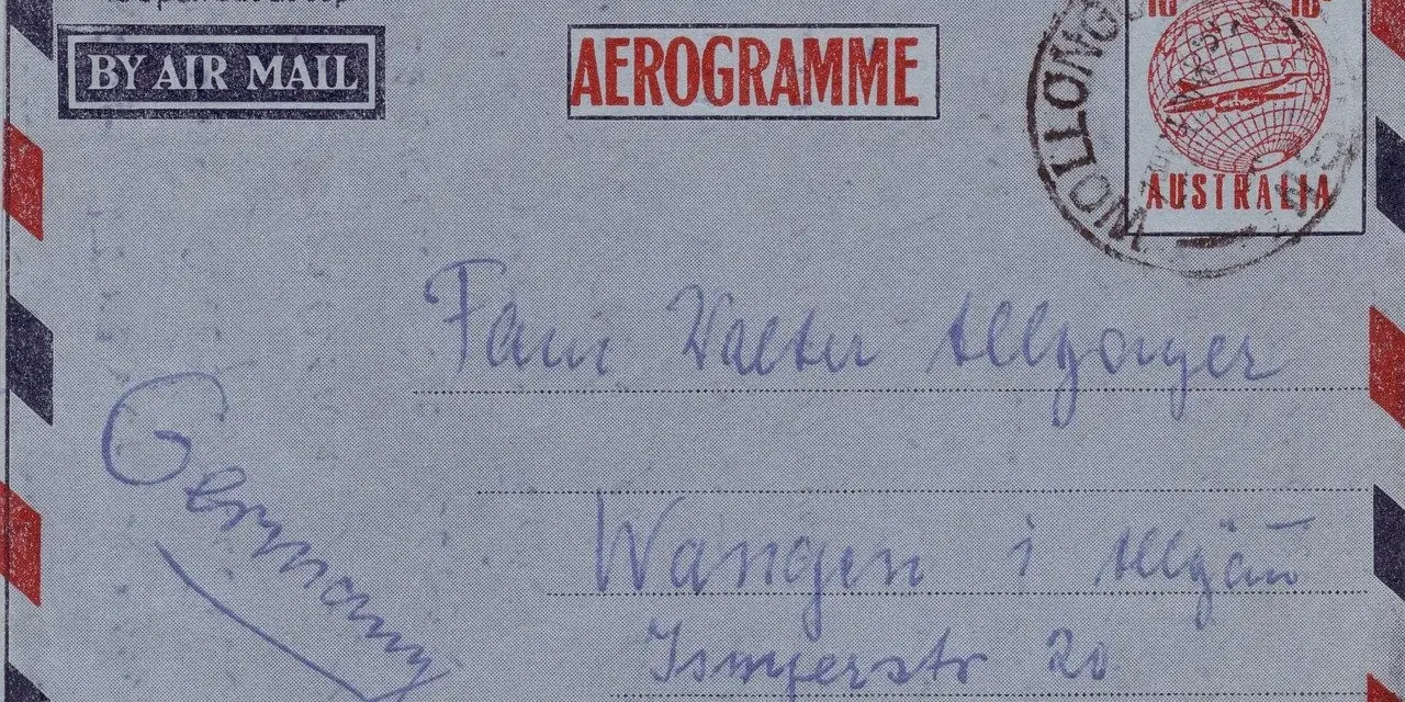 Aerogram z Niemiec do Australii. Na kopercie widnieje skrót "Szanowni Państwo" w formie odręcznego napisu.