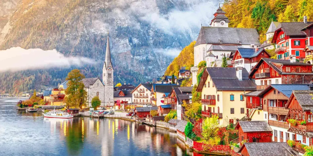 Scenic Hallstatt, Austria, a picturesque village nestled by a lake, perfect for a train journey from Prague.