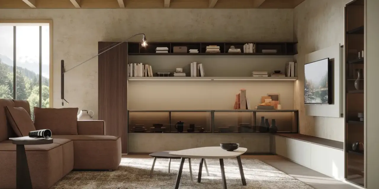 Soggiorno moderno con divano marrone, tavolini e libreria a parete. Le pareti in **colori neutri per pareti** creano un'atmosfera rilassante.