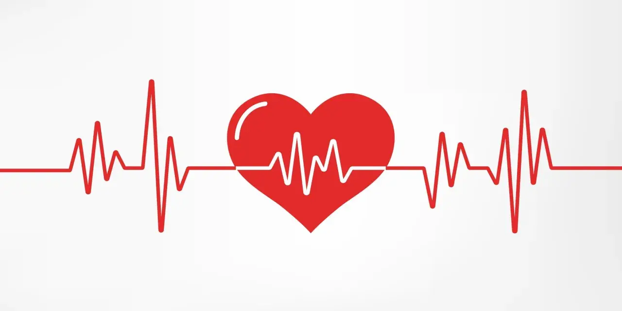 Czerwone serce z linią EKG, symbolizujące puls norma.