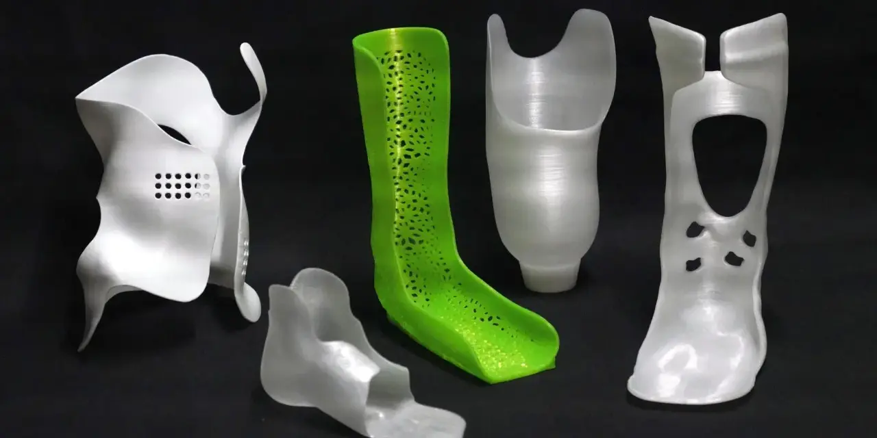 A collection of orthopedic devices, including braces and prosthetic components, showcase the versatility of polypropylene 3D printing.