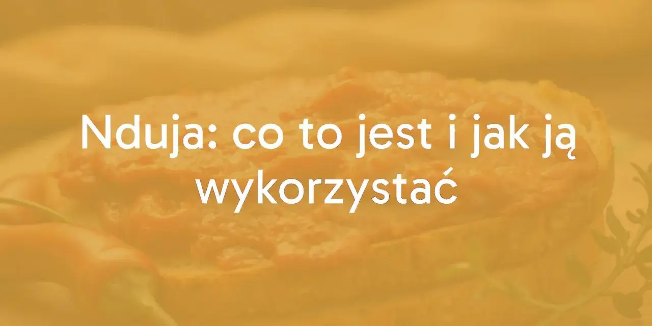 Nduja: co to jest i jak ją wykorzystać. Pikantna pasta na chlebie, z papryczką chili w tle.