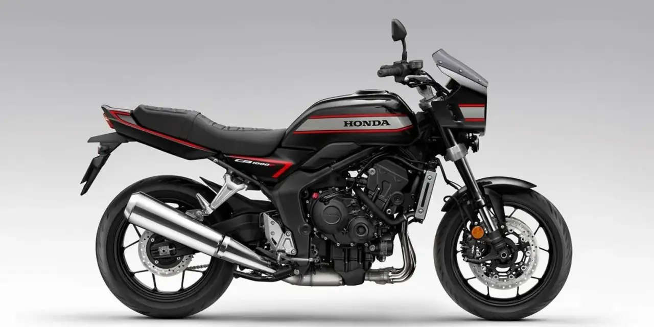 Czarny motocykl Honda CBR 1000F z czerwonymi i srebrnymi akcentami, gotowy na przygodę.