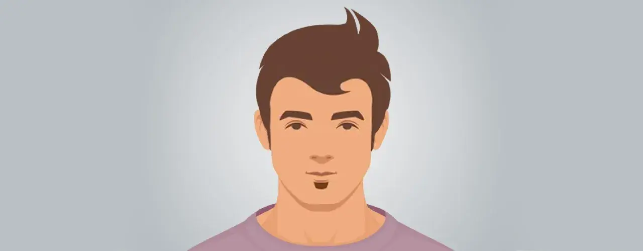 Un hombre con un peinado moderno y una barba mosca.