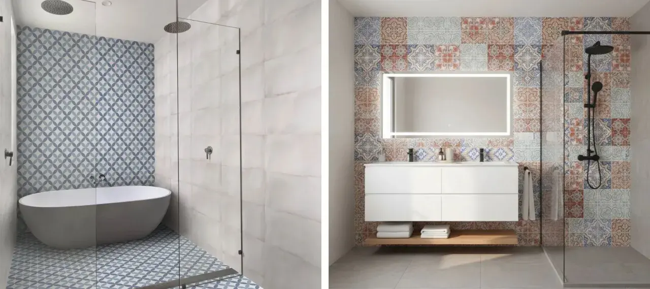 Salle de bain moderne avec baignoire et douche, murs ornés de **carrelage collé** aux motifs géométriques bleus et de carreaux décoratifs colorés.