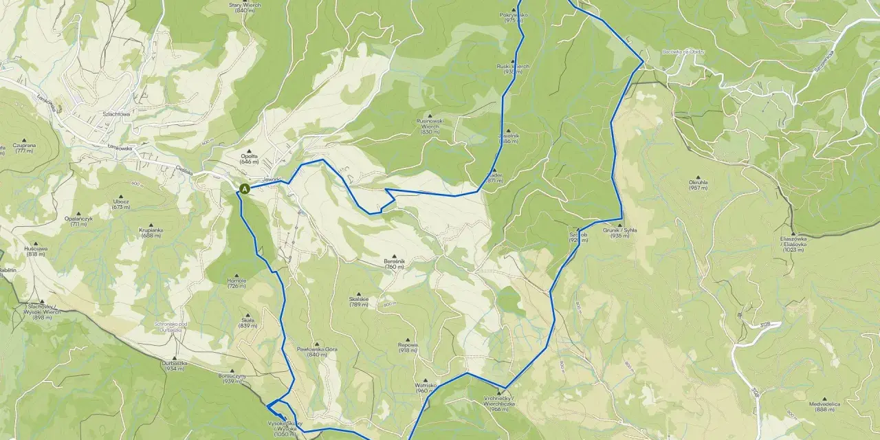 Trasa rowerowa przez **szczawnickie góry**, z widokiem na szczyty takie jak Durbaszka i Jaworzyna.
