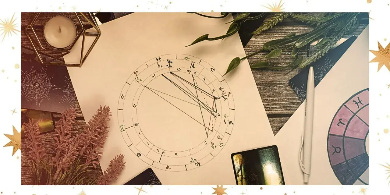 Astrologiczna mapa nieba z symbolem raka. Świeca, zioła i karty tworzą mistyczną atmosferę.