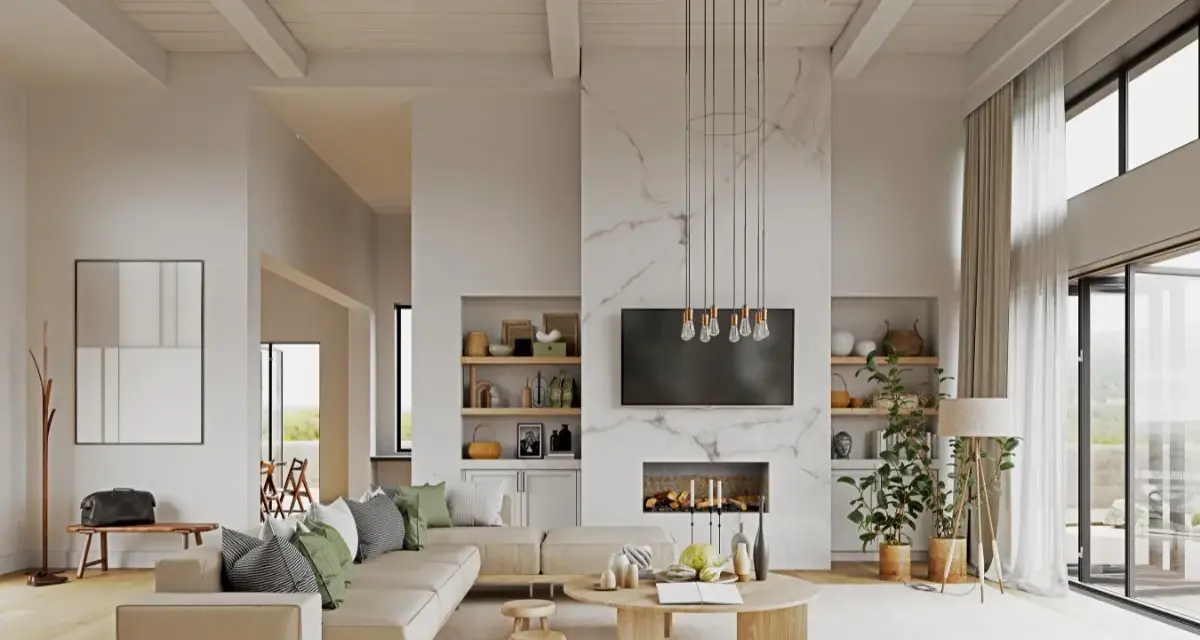 Soggiorno moderno con divano beige, camino in marmo e soffitto con travi a vista. Diversi tipi di bianco dominano l'ambiente, creando un'atmosfera luminosa e ariosa.