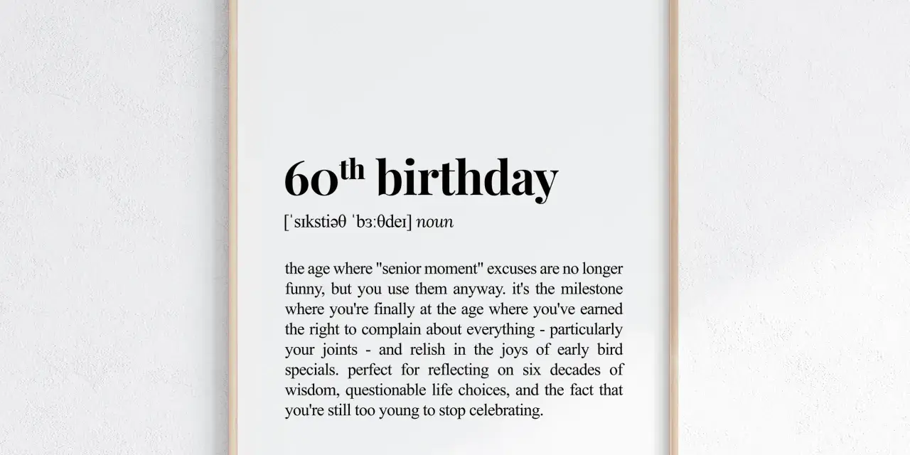 Gerahmtes Poster mit der Definition von "60. Geburtstag" in schwarzer Schrift auf weißem Hintergrund.