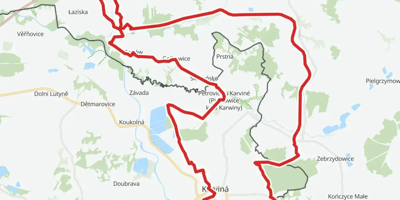 Mapa z zaznaczonym na czerwono żelazny szlak rowerowy godów, prowadzący przez tereny Czech i Polski, w tym okolice Karwiny i Jastrzębia-Zdroju.