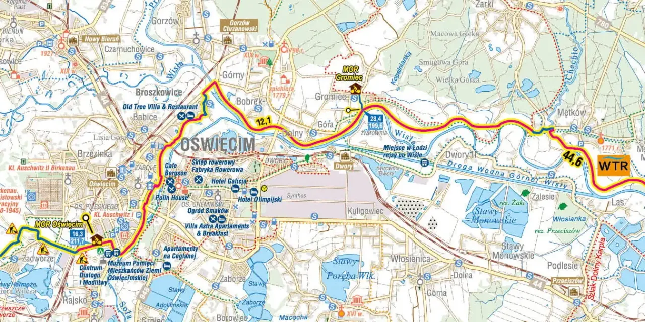 Trasy rowerowe Małopolska: mapa okolic Oświęcimia z zaznaczonymi szlakami, atrakcjami i drogami wodnymi Wisły.