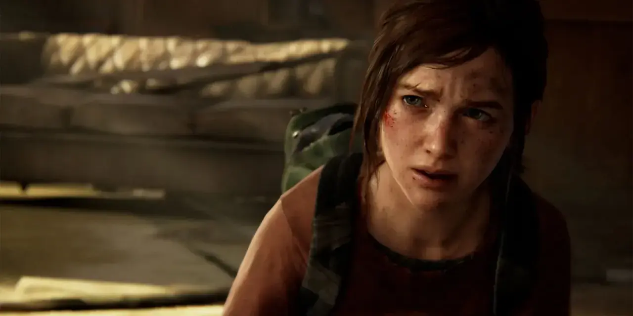 Ellie, con el rostro sucio y herido, busca en una **caja fuerte de hotel** en The Last of Us.