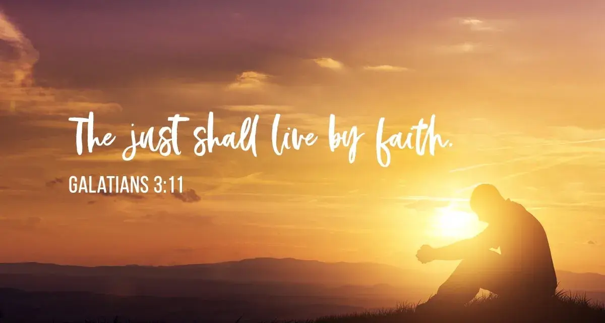 A silhouette of a person praying at sunset, with the text "The just shall live by faith. GALATIANS 3:11" overlayed.