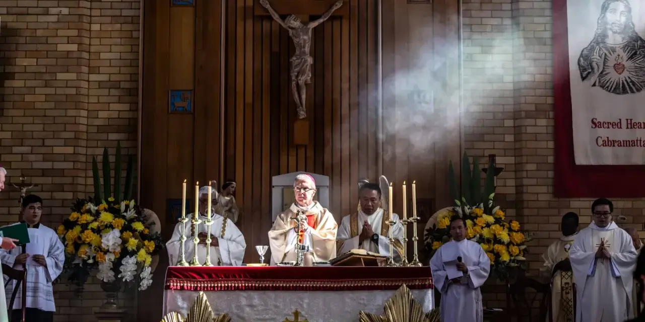 Clergy at an altar during a religious service. The length of vigils can vary, but this scene captures a moment of solemnity.