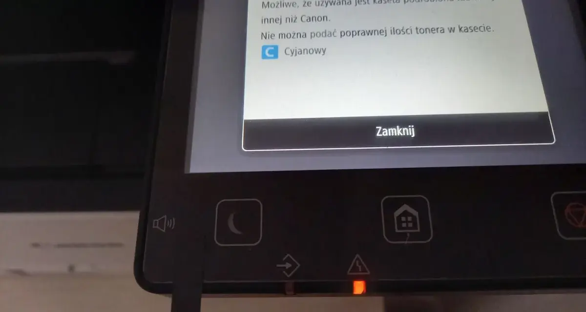 Na ekranie drukarki Canon MF645cx komunikat o nieoryginalnej kasecie z tonerem cyjanowym.
