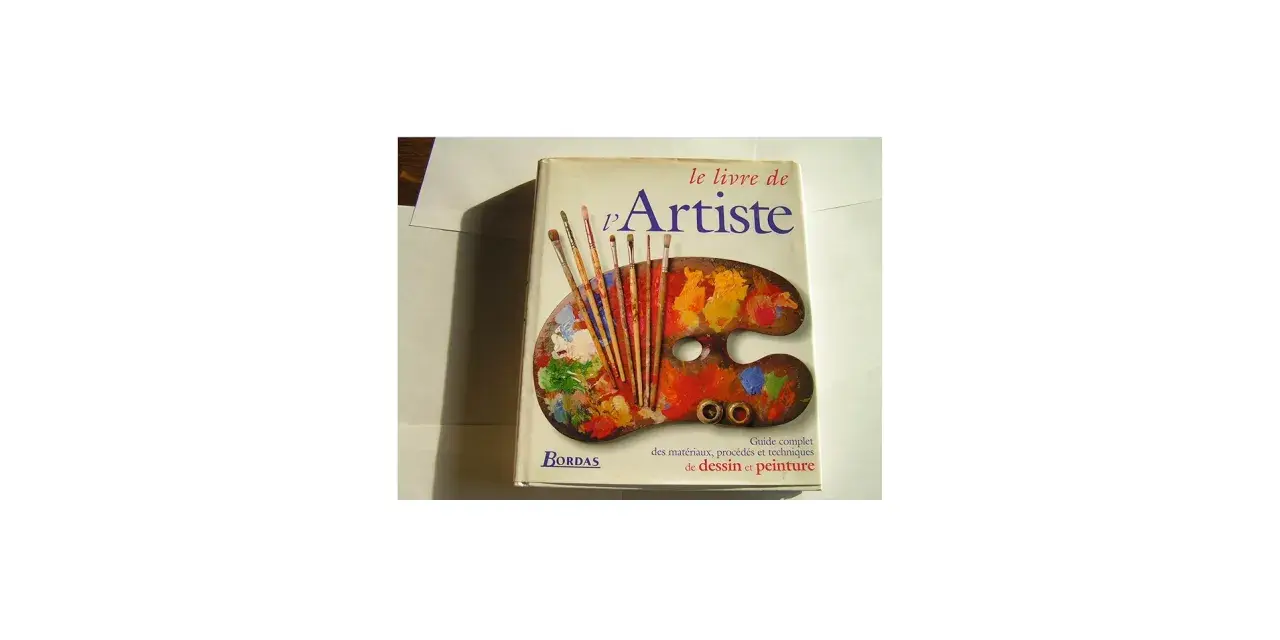 Le livre "L'Artiste" de Bordas, un guide pour devenir artiste auteur, avec une palette de peintre et des pinceaux.