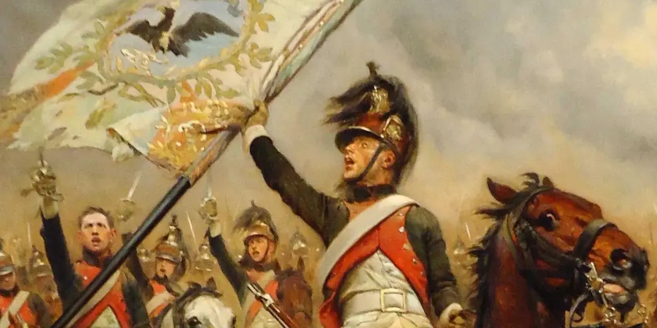 Un porte-étendard, au cœur des 10 batailles de Napoléon, brandit fièrement l'aigle impérial. Cavaliers et chevaux chargent.