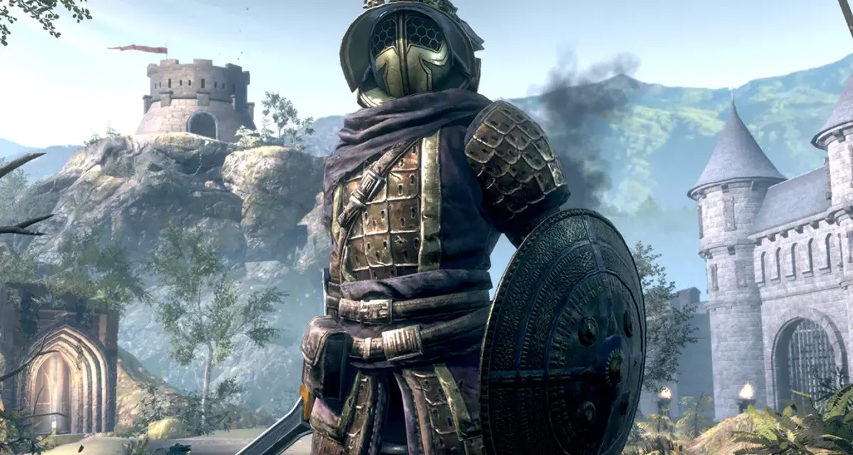 Guerrero con armadura dorada y escudo redondo, listo para la batalla en The Elder Scrolls: Blades.