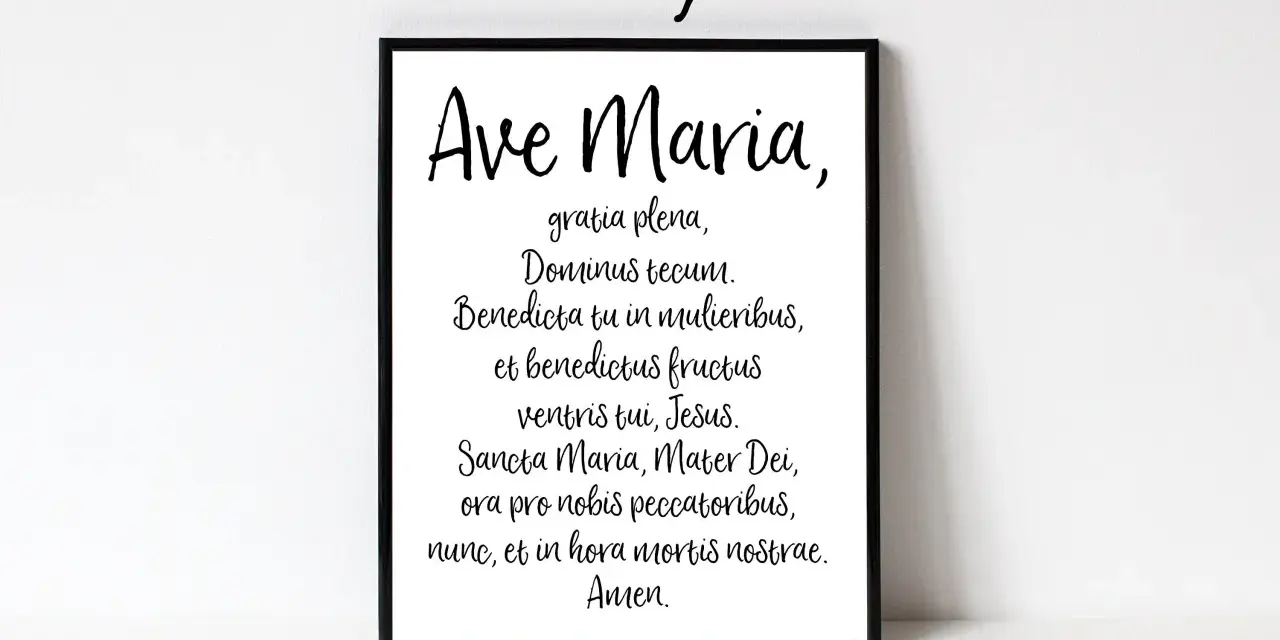 A framed print displays the "Ave Maria" prayer in Latin, perfect for a moment of reflection or a beautiful chant.