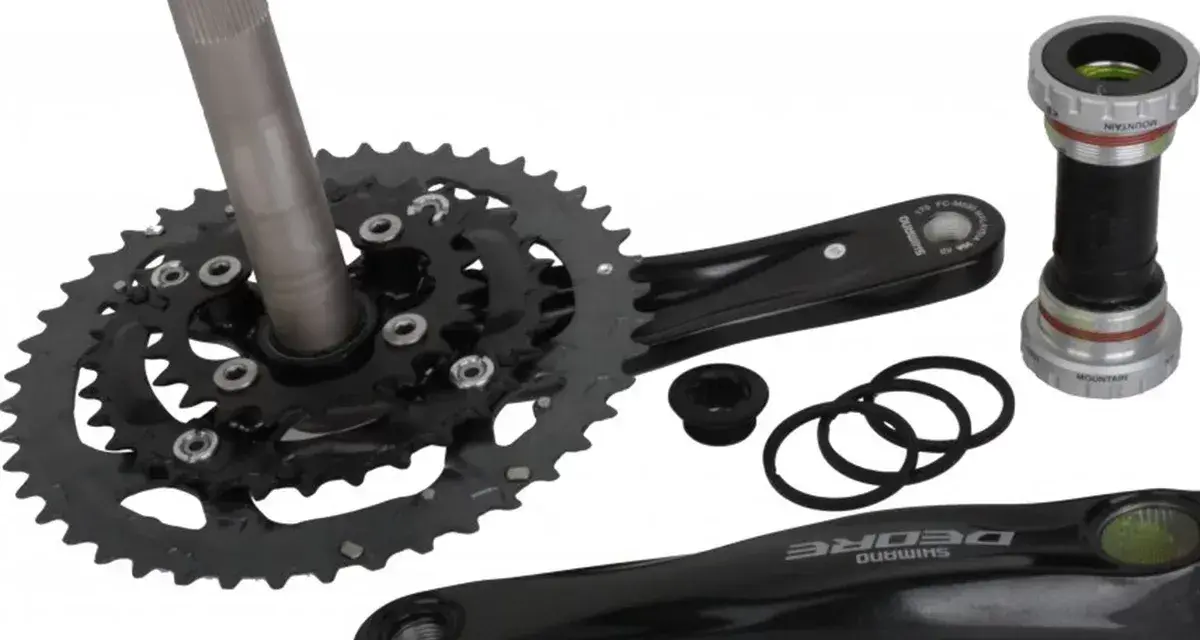 Zestaw rowerowy: korba Shimano Deore, suport i akcesoria. Gotowy do montażu, by napędzał Twoje przygody.