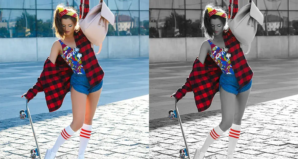 Jeune femme avec un skateboard, chemise à carreaux rouge, short en jean et chaussettes rayées. La photo présente une désaturation partielle, mettant en valeur les couleurs vives de sa tenue.